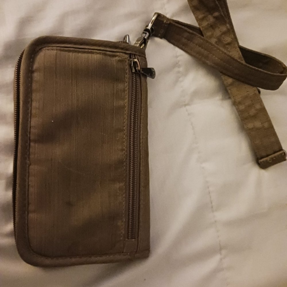 Small tan clutch